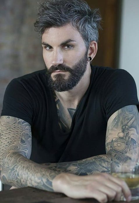 bearded man with tattoos