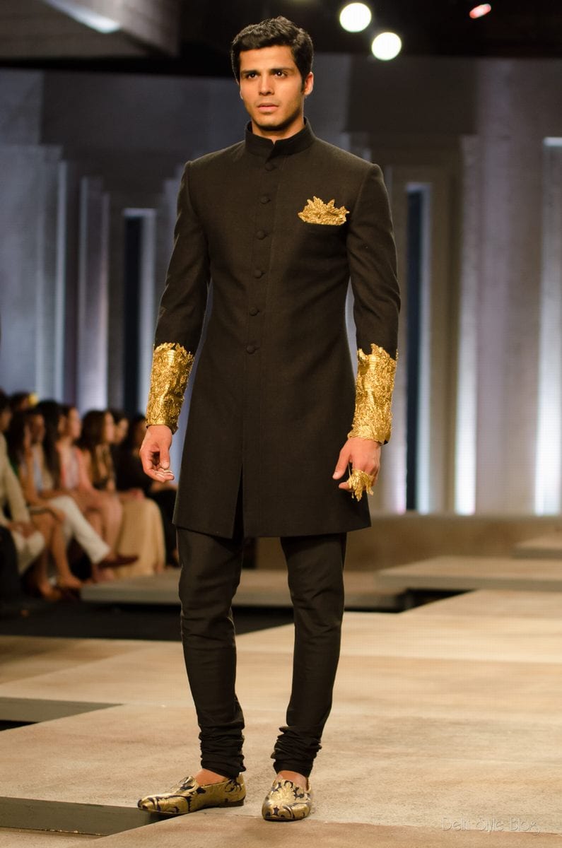 black sherwani with golden pattern