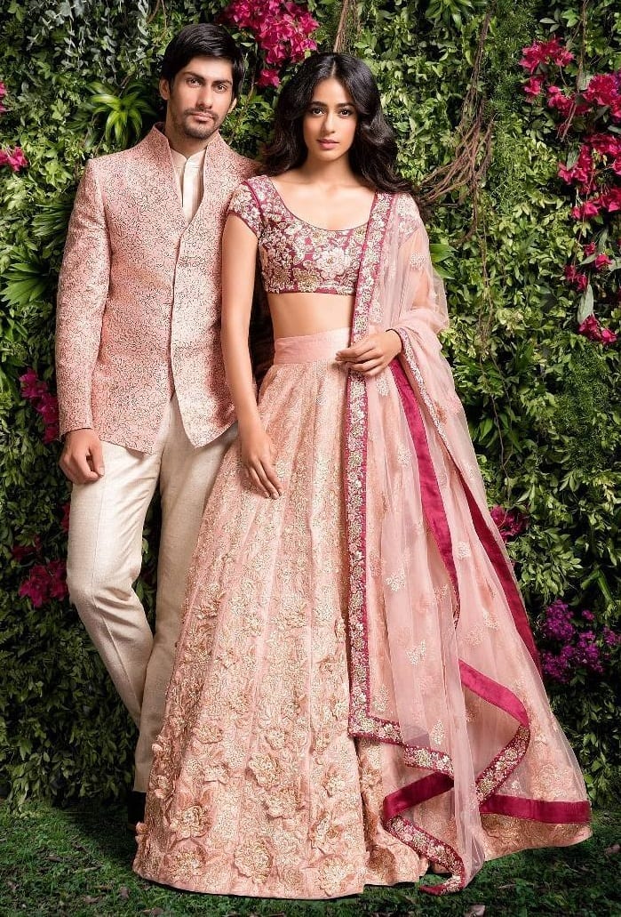 Contrasting colour Sherwani and lehenga for Sangeet