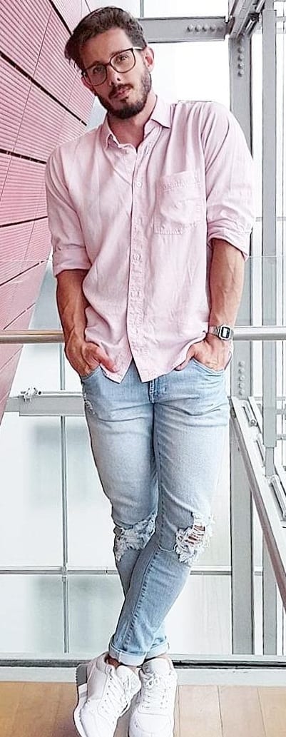 blue ripped denim with pink shirt
