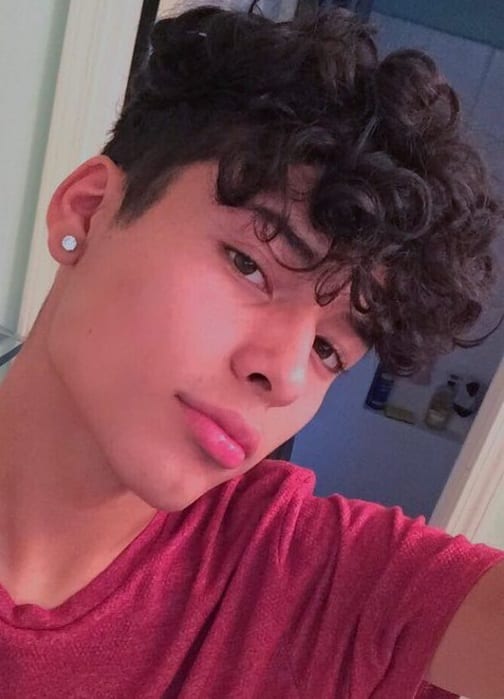curly faded side part