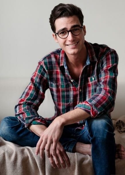flannel shirt guy with glasses