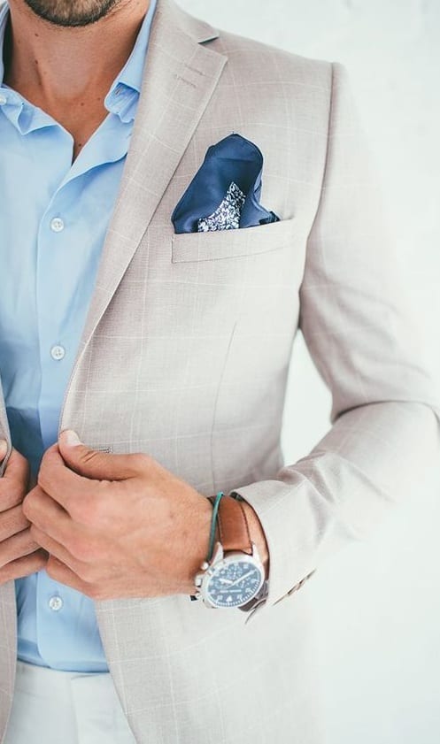 navy blue pocket square with white suit