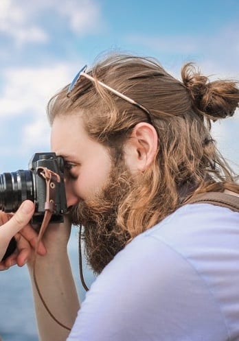 half man bun with medium beard