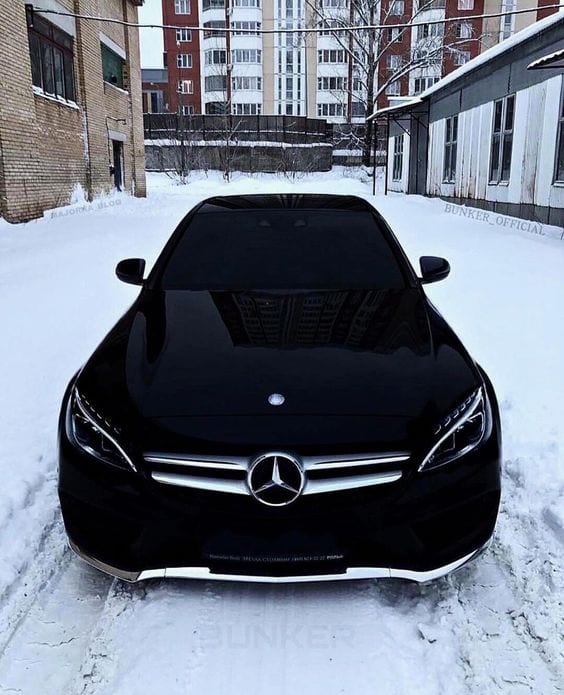 BLACK MERCEDES IN SNOW