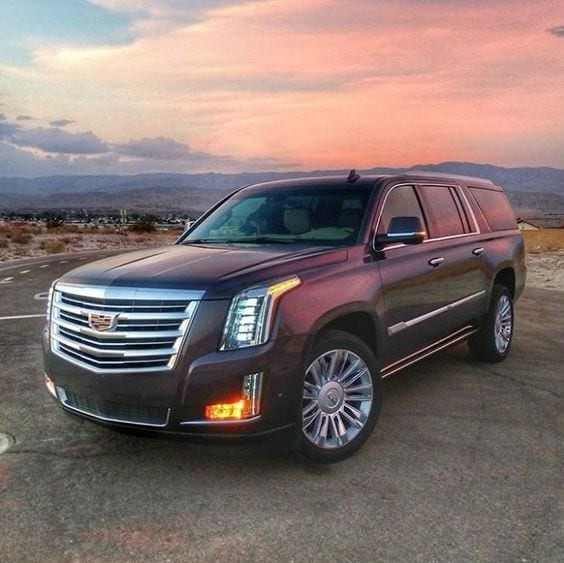 RED CADILLAC SUV