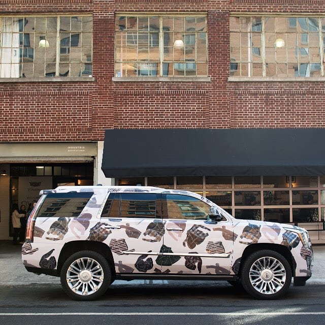 WHITE MATTE CADILLAC SUV