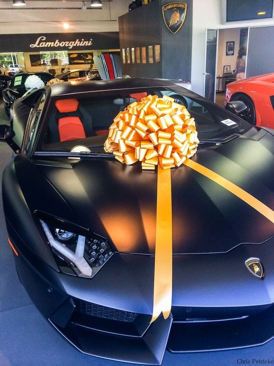 Black Matte Lamborghini with a golden bow