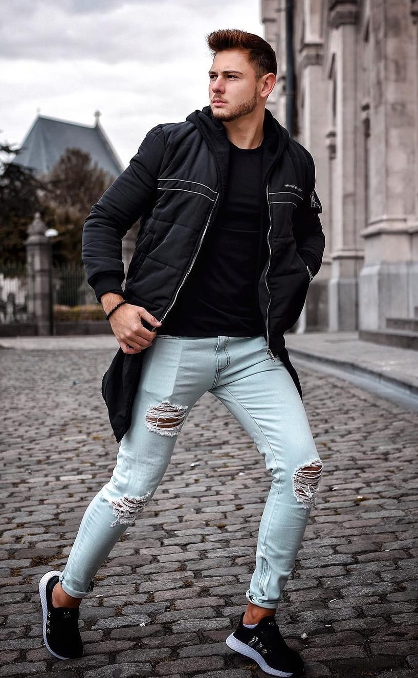 Black jacket,black t-shirt with blue distressed denims