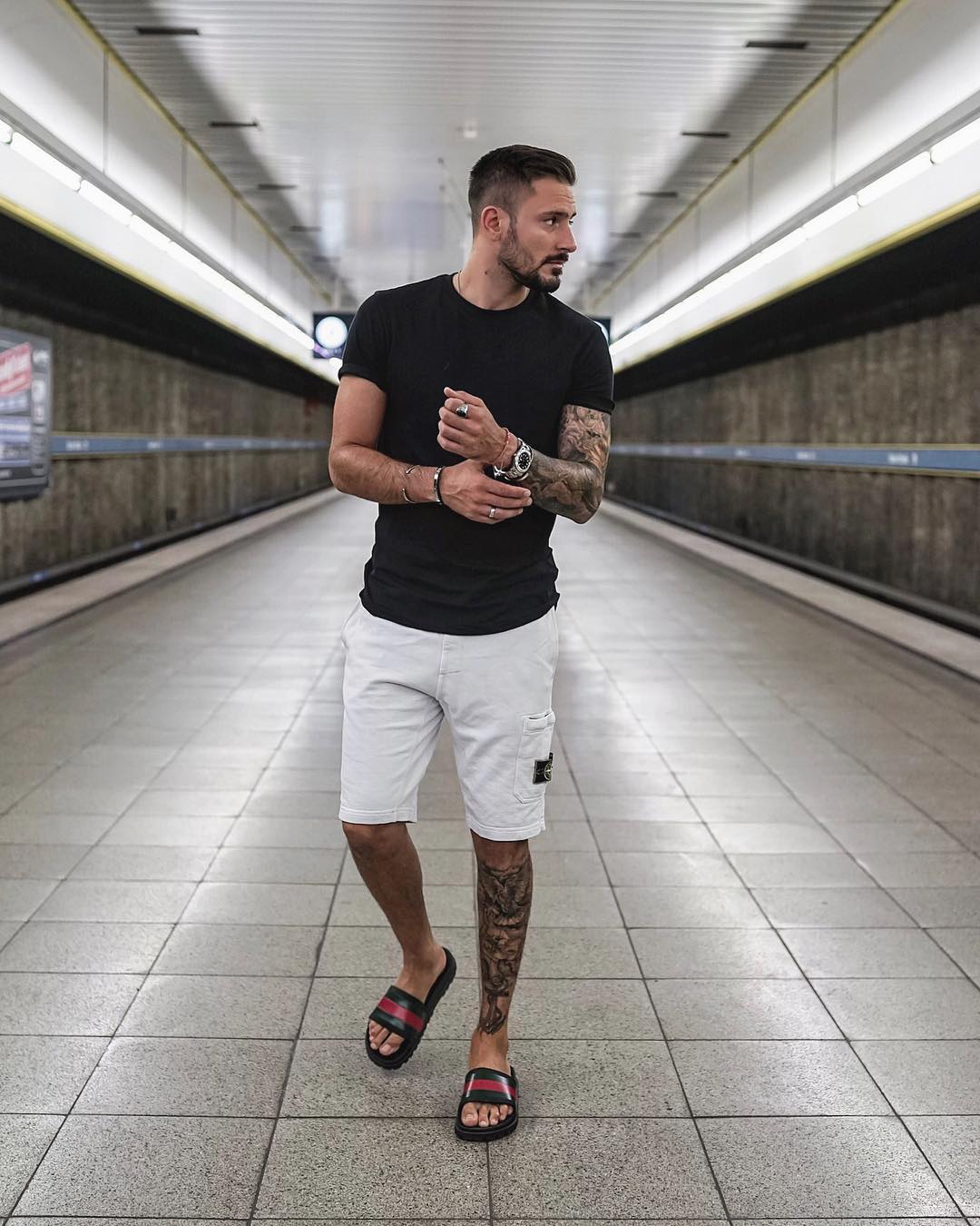 Black solid t shirt,White shorts and white sneakers