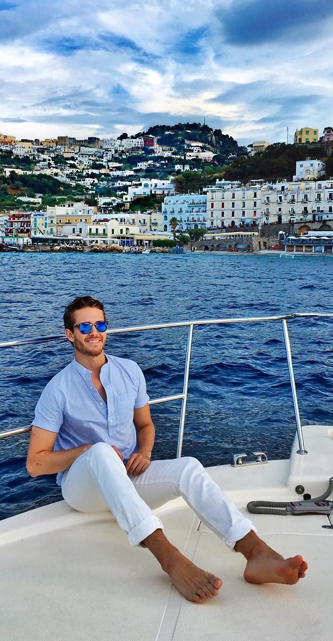 Blue linen shirt and white pant with sunglasses