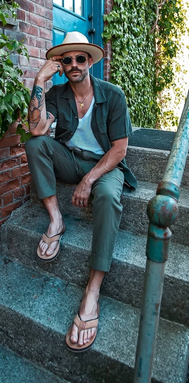 Green chinos with hat and sunglasses for stylish men
