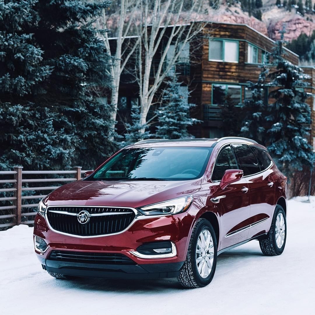 MAROON ENCLAVE BUICK CAR