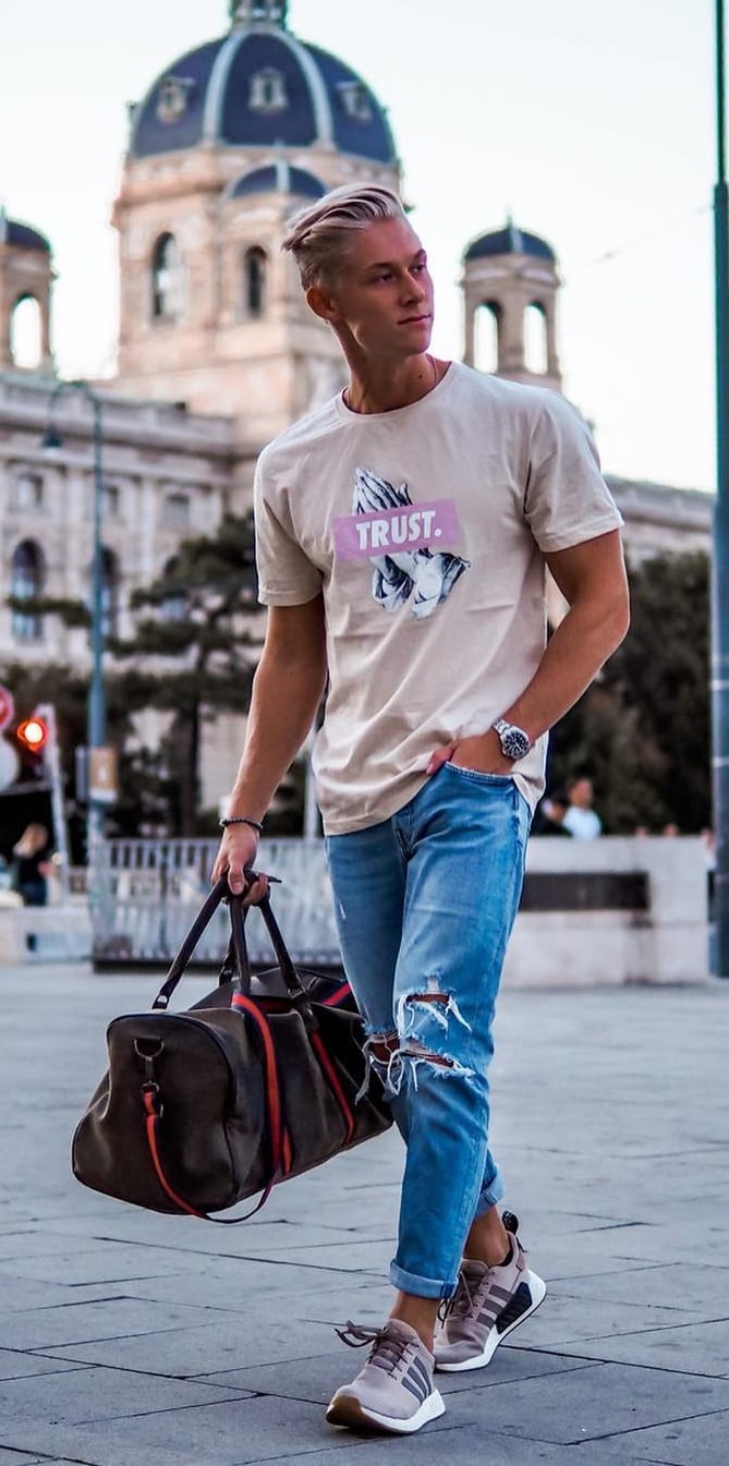 Shredded Blue denims, bag ,cream t-shirt