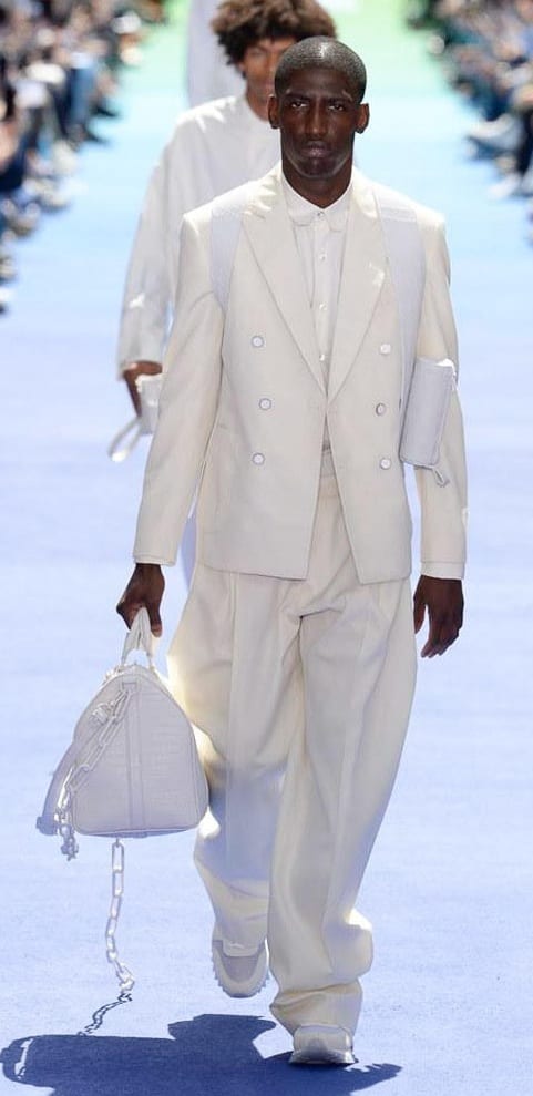 White suit and white sneakers with a white bag