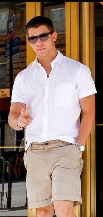 Classic white shirt beige shorts for yacht party