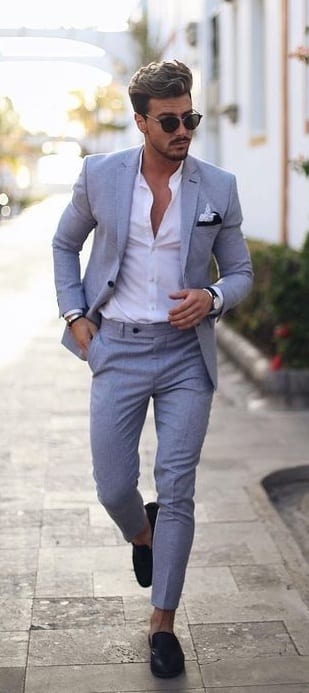 Grey suit, white shirt,sunglasses