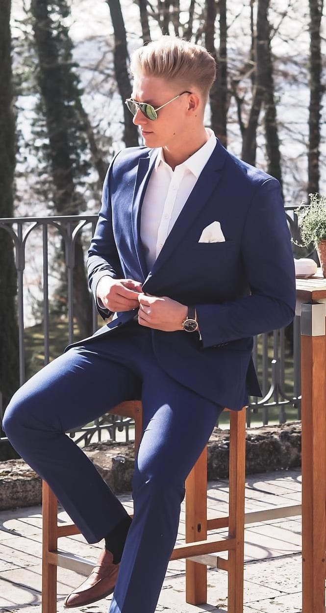 Blue suit white shirt and pocket square