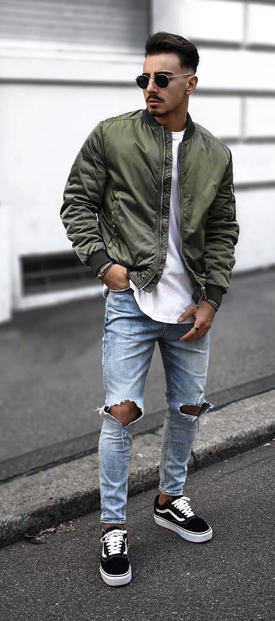 Green Bomber Jacket and Blue Ripped Denims Outfit