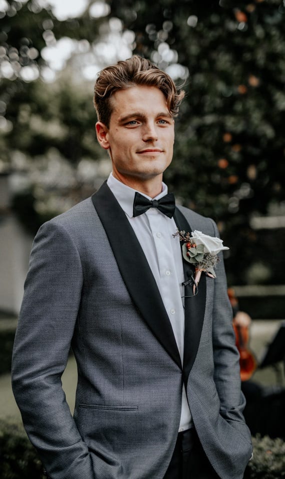 Grey Tuxedo Suit, Bow Tie and Boutonniere for the Groom