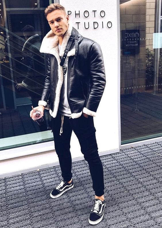Pulling off leather jacket with sneakers