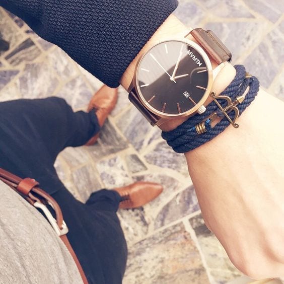 Dark-Blue-Bracelet-styled-with-a-Rose-Gold-Watch-gives-it-a-stylish-look-1