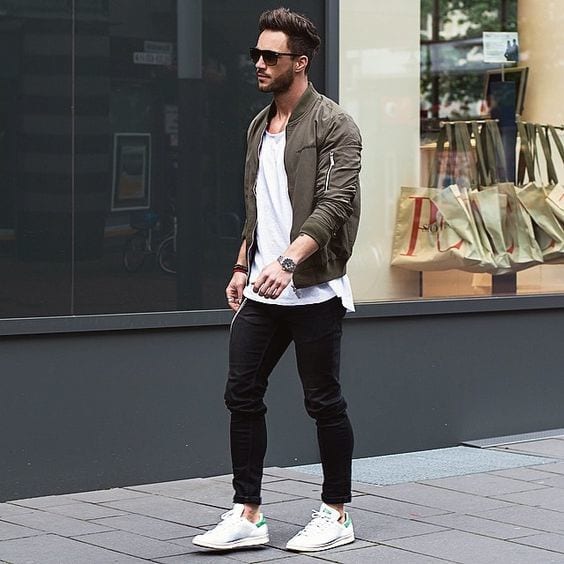 Olive-Bomber-jacket-styled-with-White-T-shirt-Black-Jeans-and-a-pair-of-White-Low-Top-Sneakers-1
