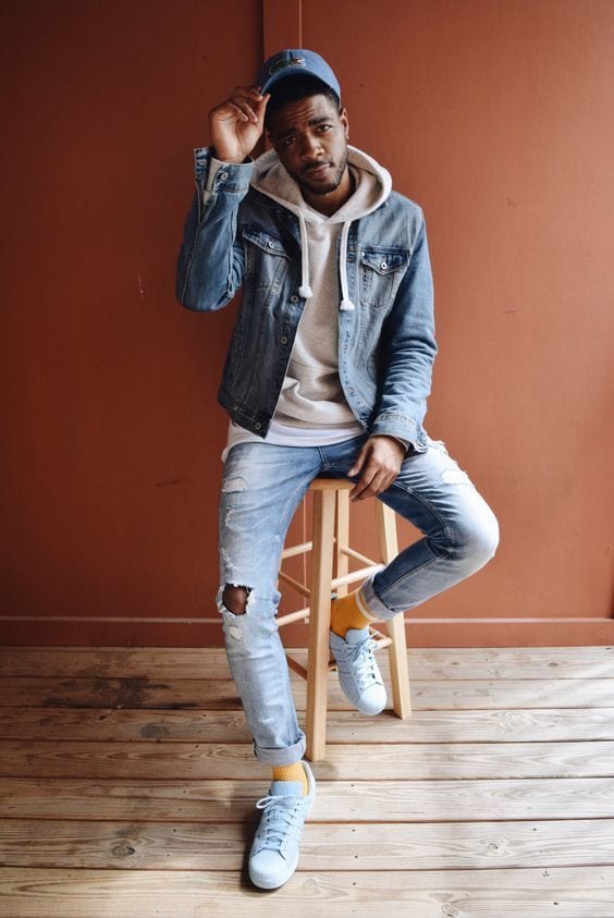 White-Low-Top-Sneakers-styled-with-Blue-Denim-Jacket-Beige-Hoodie-White-T-shirt-and-a-pair-of-Light-Blue-Destroyed-Jeans-1