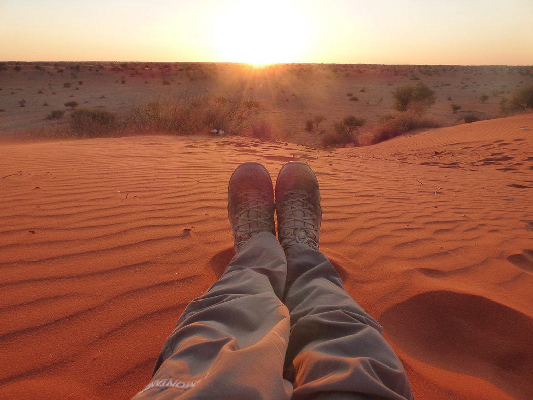 rsz_1person-seating-red-sand-desert-sunset-sunrise