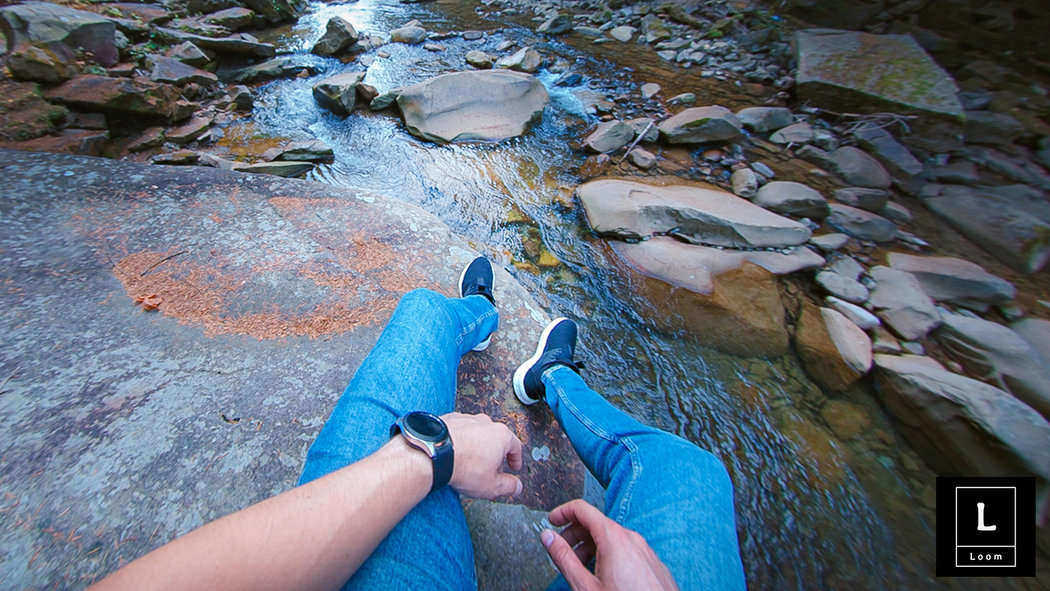 rsz_man-seating-rocks-river-black-watch-sneakers-jean