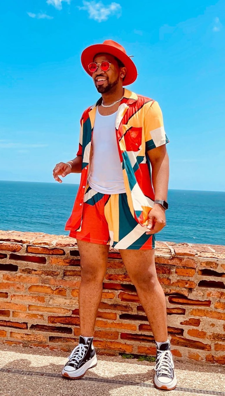 Open Printed shirts with Printed Shorts and color cordinated shirt for a fun vacation look