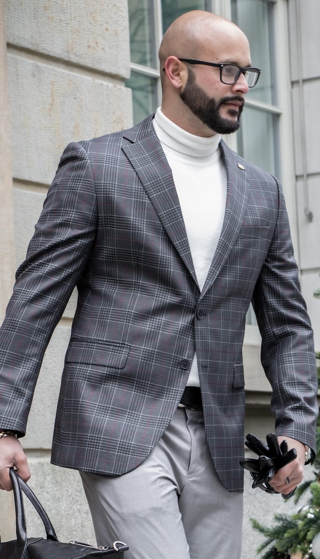 Modest Suit Looks for Men with Suit over a turtle neck tee.