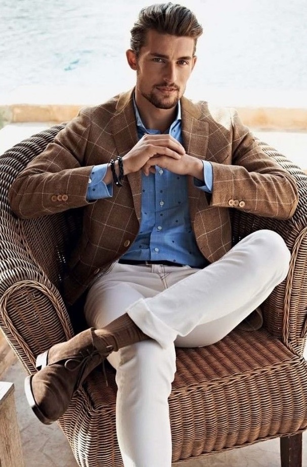 Blue buttoned shirt with brown checkered suit. Wearing a brown boots and socks_