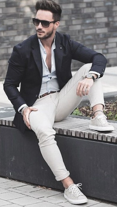 White undershirt with black shirt and cream pants. Wearing it with belt, shades and watch_