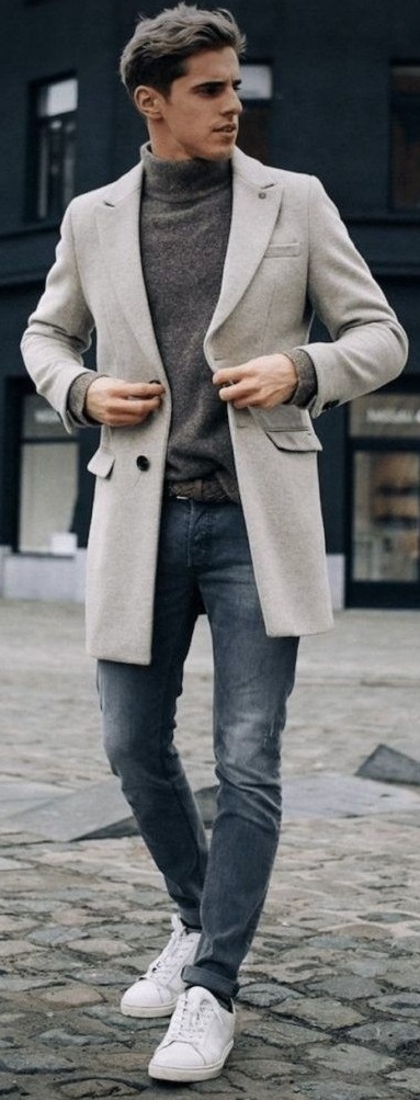 Grey turtle neck t-shirt with light grey colored overcoat. wearing a white sneaker and belt_