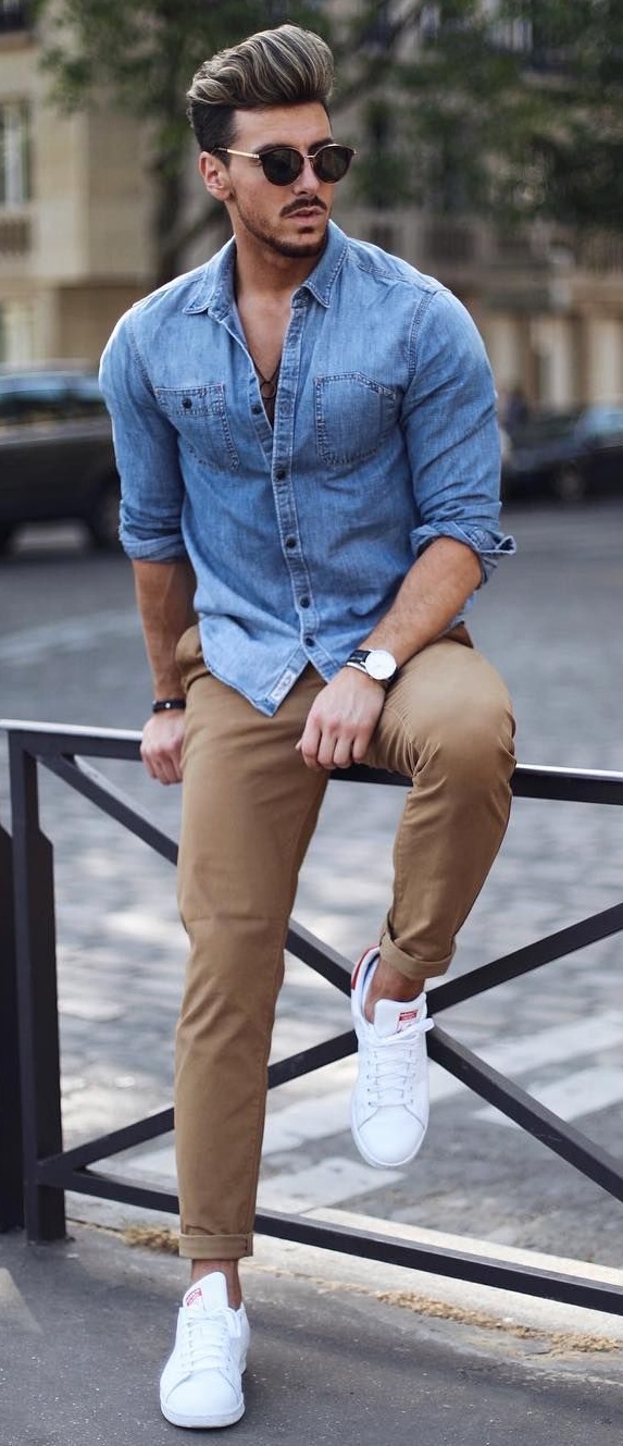 beige jeans with denim shirt, shades, watch and a bracelet, wearing a white sneakers_