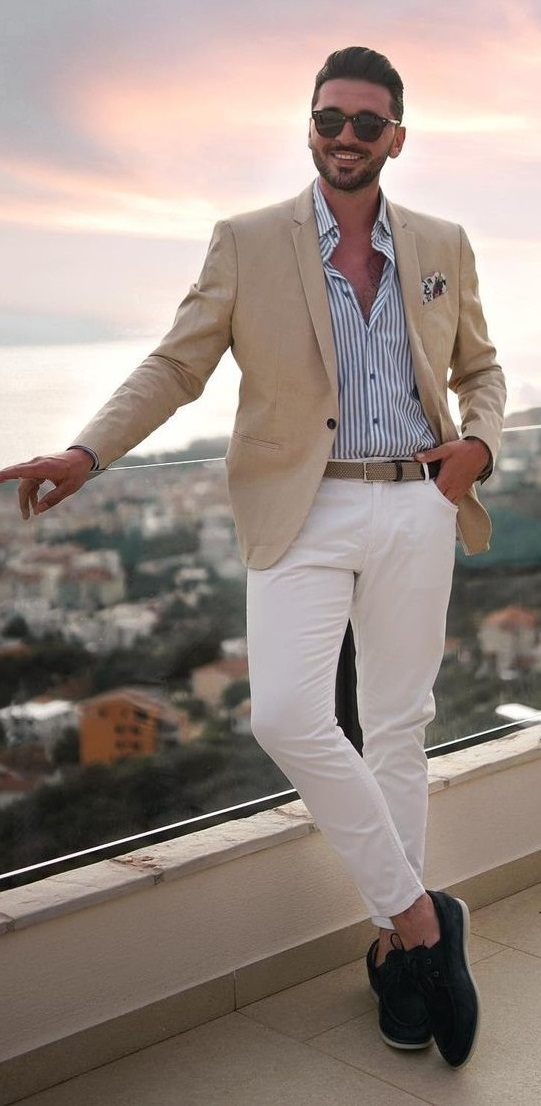 blue and white stripped t-shirt with beige suit and white chinos accessorized with pocket square, shades and brown belt