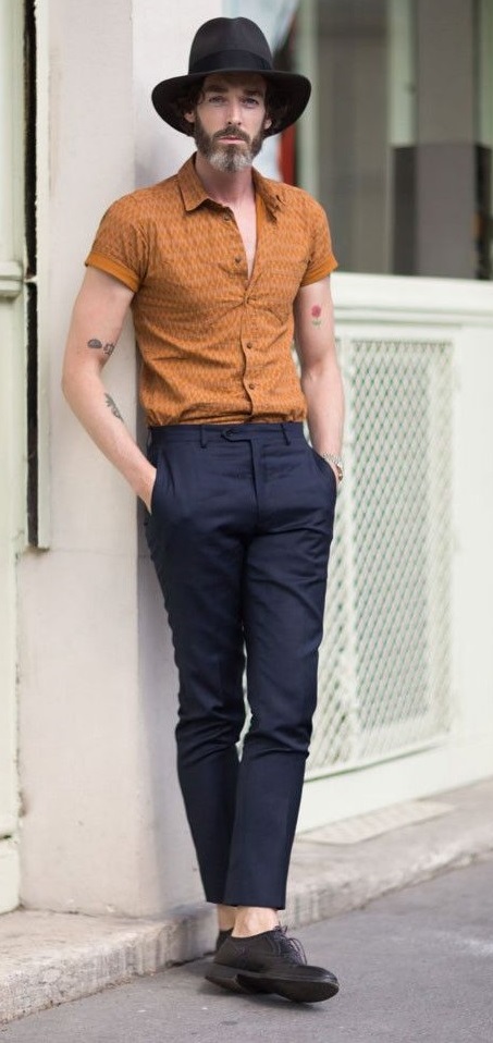 blue trouser with brown shirt and hat_