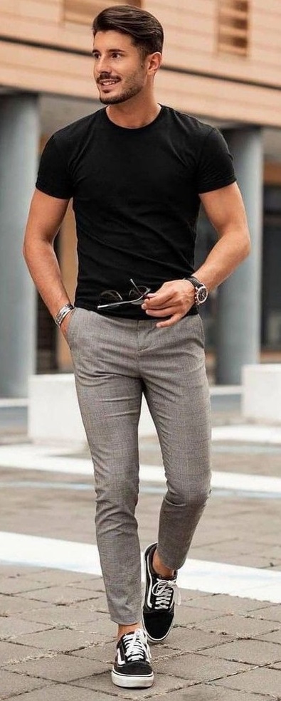 grey chinos with black t-shirt, watch and a bracelet_