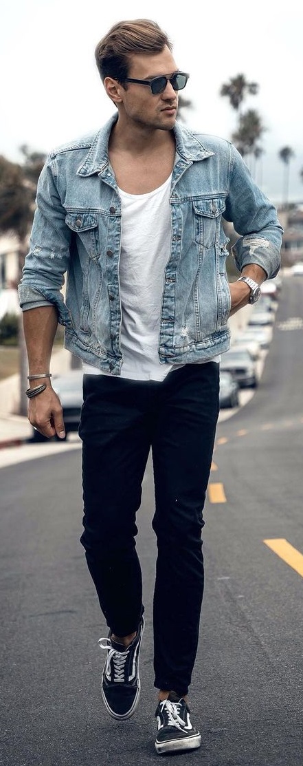 denim jacket with white denim bottom and sport shoes accessorized with shades and watch