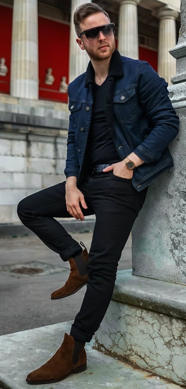 black outfit with a denim jacket, accessorized with shades, watch and shoes