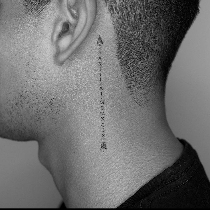 Minimalist Arrow Tattoo Behind the Ear